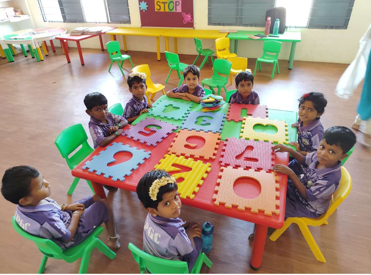Children learning together through activity-based classroom work